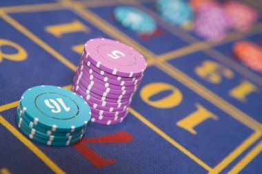 Live roulette betting interface Live roulette table interface showing betting layout and dealer feed